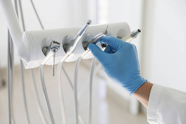 Professional Tooth Extraction technician working in Cedar Park, TX
